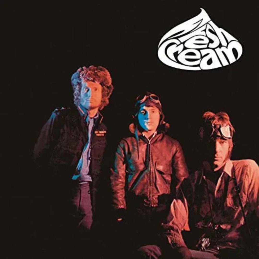 Fresh Cream album cover featuring black background with images of Clapton, Bruce, and Baker.


