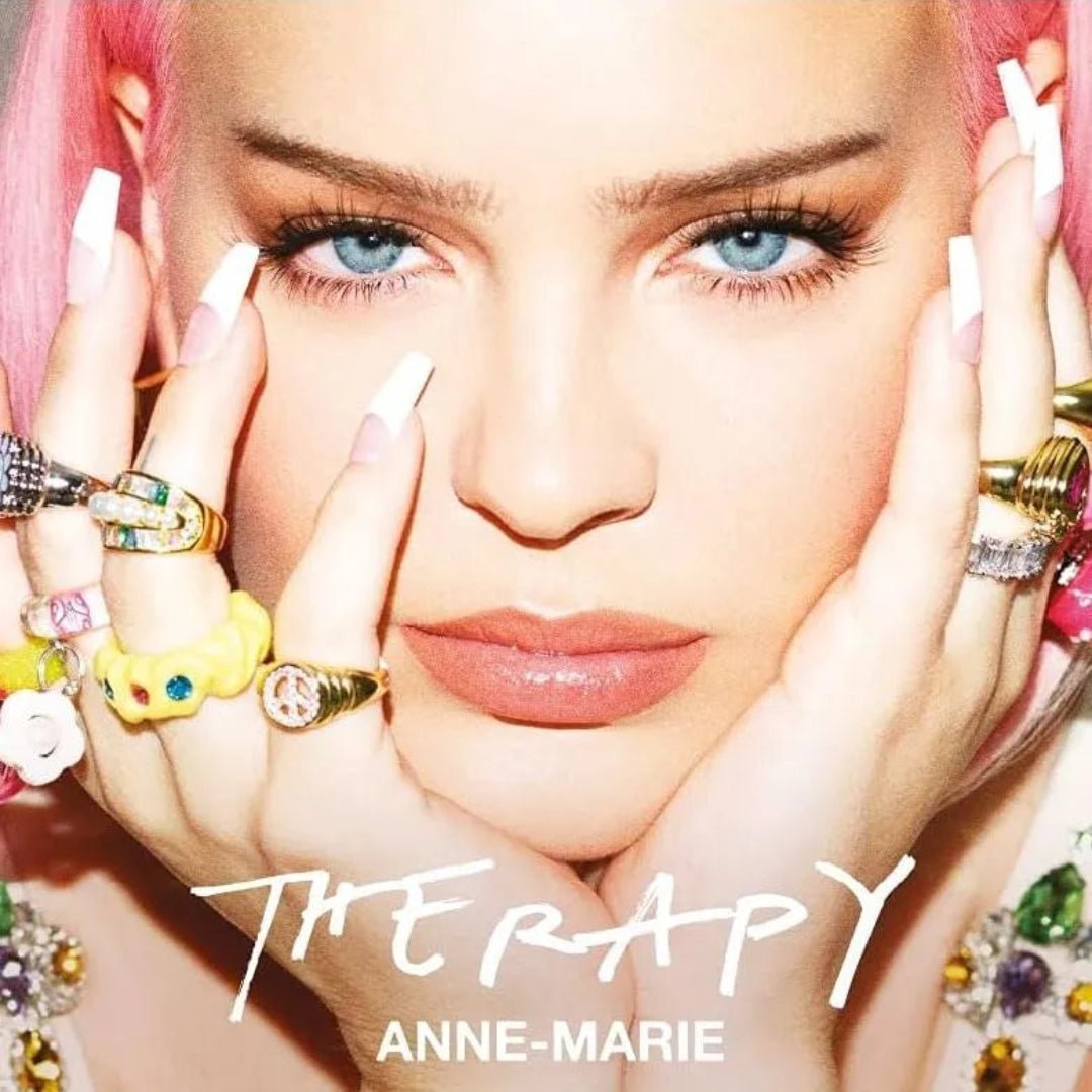 Close-up of turquoise vinyl edition of Anne-Marie’s Therapy album with stylized artwork.
