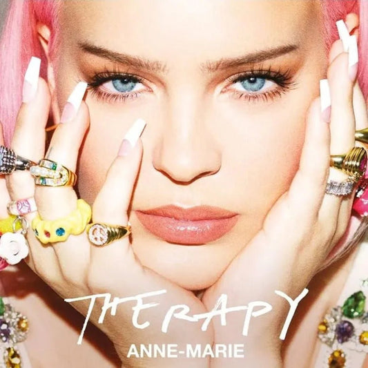 Close-up of turquoise vinyl edition of Anne-Marie’s Therapy album with stylized artwork.