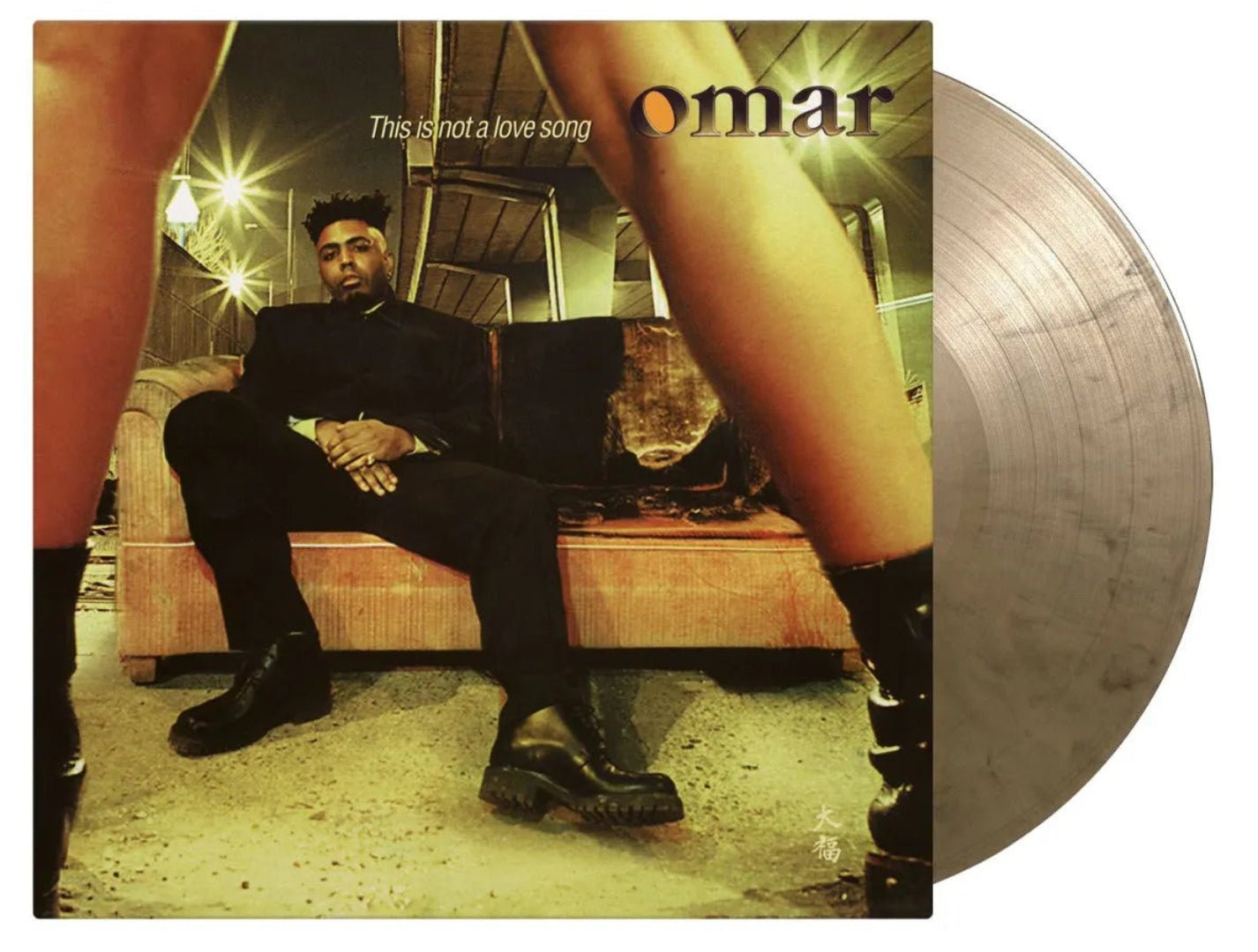 Cover art of Omar’s 1997 soul album This Is Not A Love Song on vinyl

