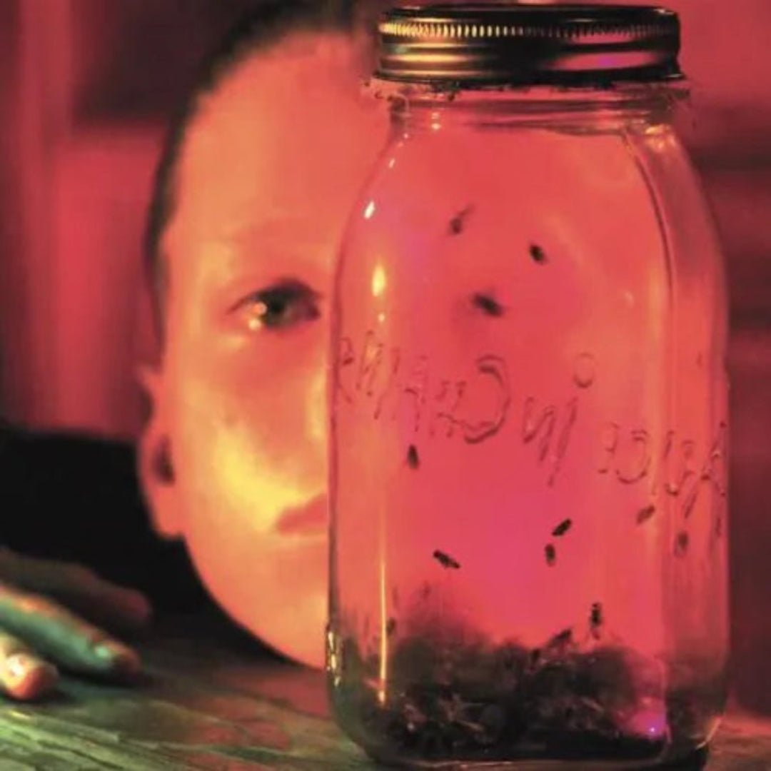 Front cover of Alice In Chains – Jar of Flies showing iconic child-with-jar artwork