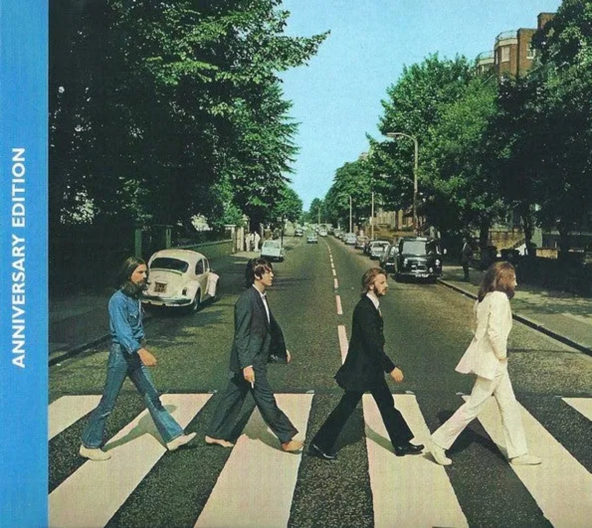 The Beatles Abbey Road LP cover featuring iconic crosswalk image, new stereo mix