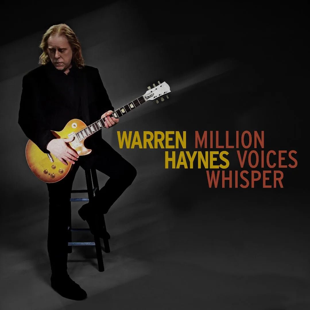 Warren Haynes album Million Voices Whisper with warm, rootsy rock artwork