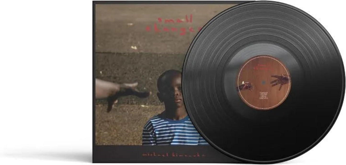 Cover art for Michael Kiwanuka’s Small Changes with bold portrait and textured backdrop.
