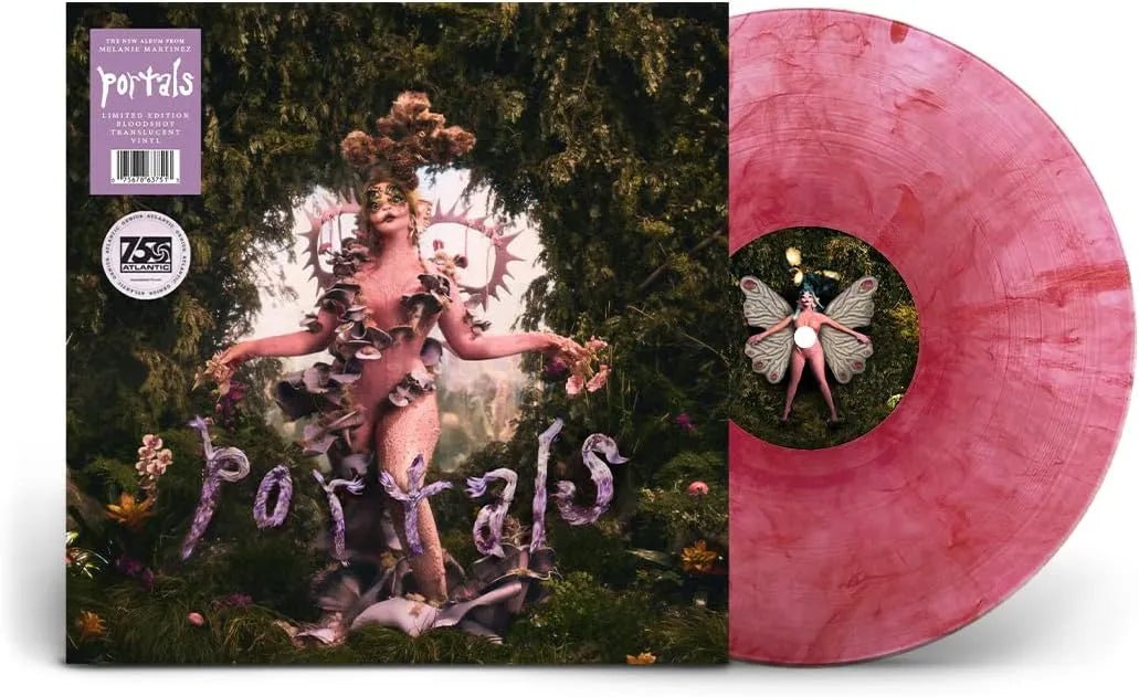 Close up Portals LP spinning Melanie Martinez bloodshot vinyl record player
