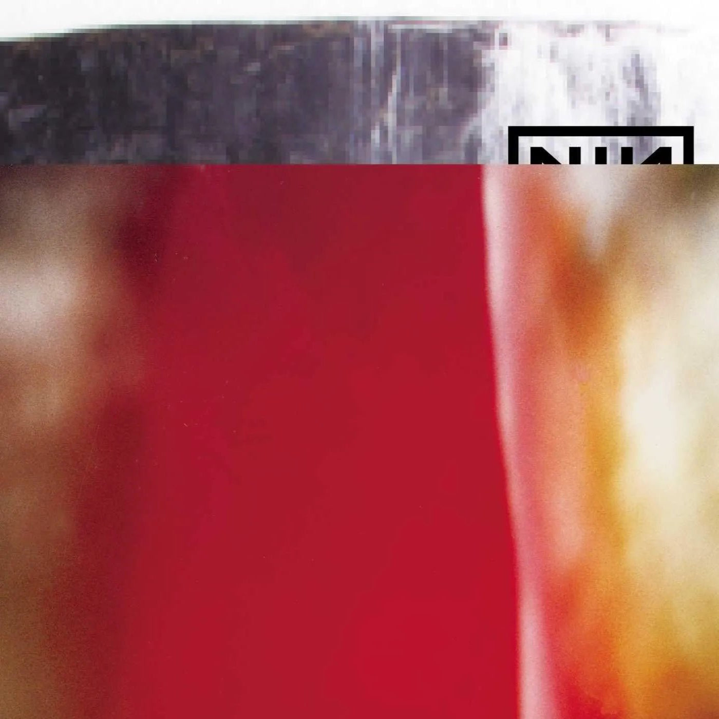 The Fragile triple LP by Nine Inch Nails featuring dark electronic rock sound.