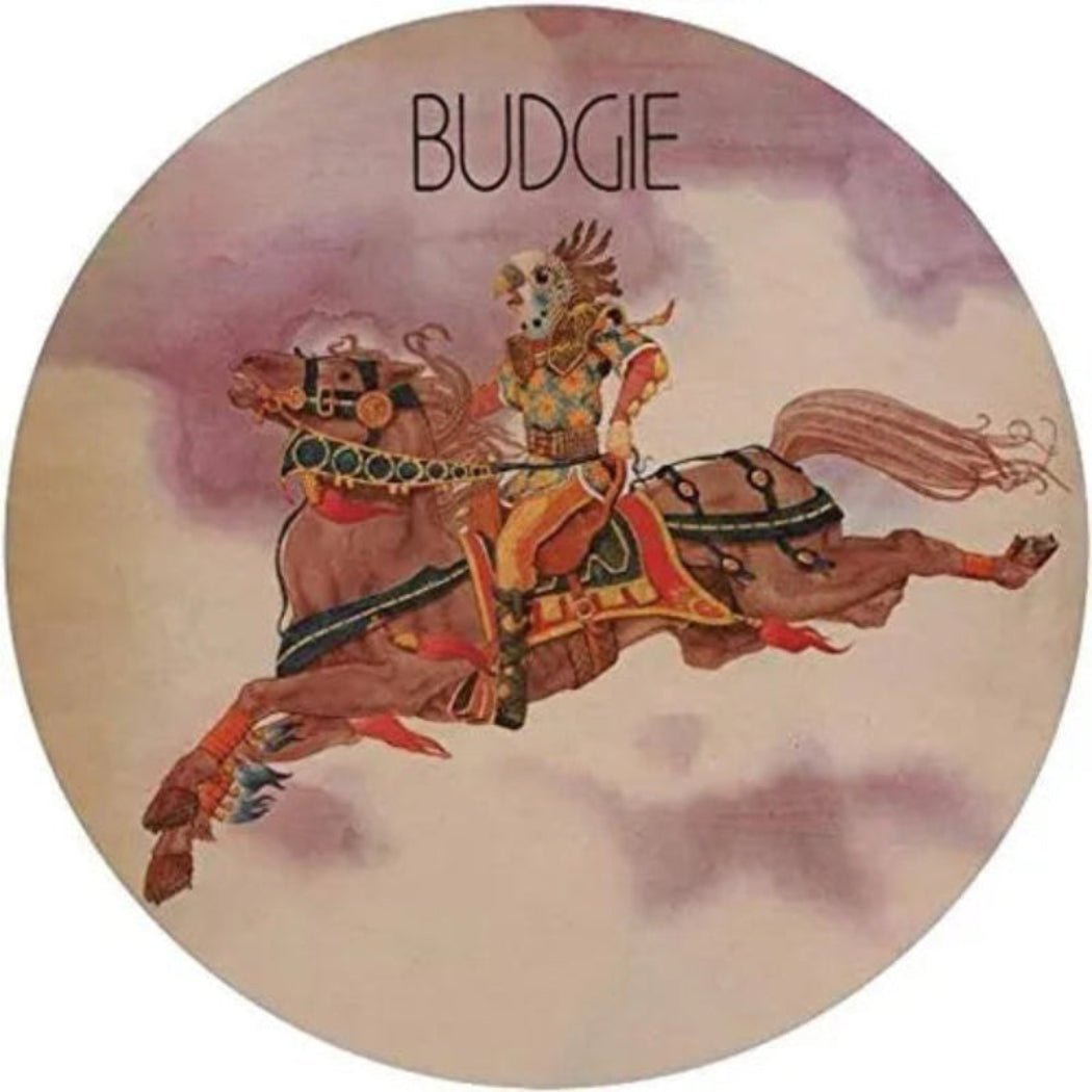 A picture disc vinyl record of the band Budgie with an illustration of a character on horseback on the label.