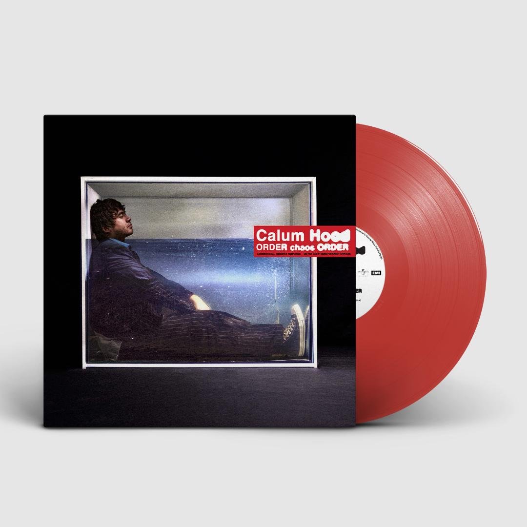 Calum Hood in a promotional photo for ORDER chaos ORDER, expressing introspective emotion.