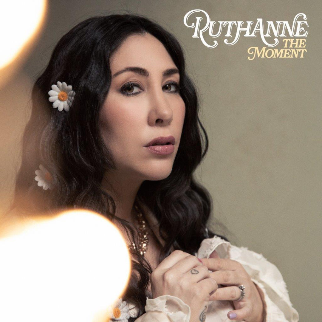 The Moment RuthAnne album artwork blending vintage design with contemporary pop elegance