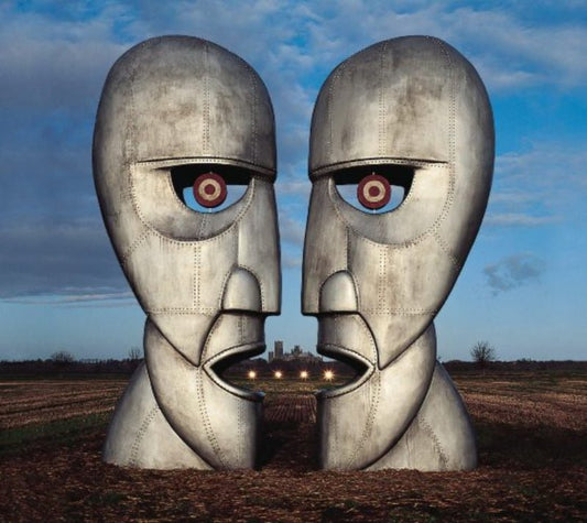 Pink Floyd’s The Division Bell 1994 album with iconic twin head cover art
