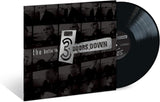Vinyl record with '3 Doors Down' album cover featuring a collage of faces.
