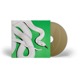 Deftones CD with a white snake design on the cover against a green background