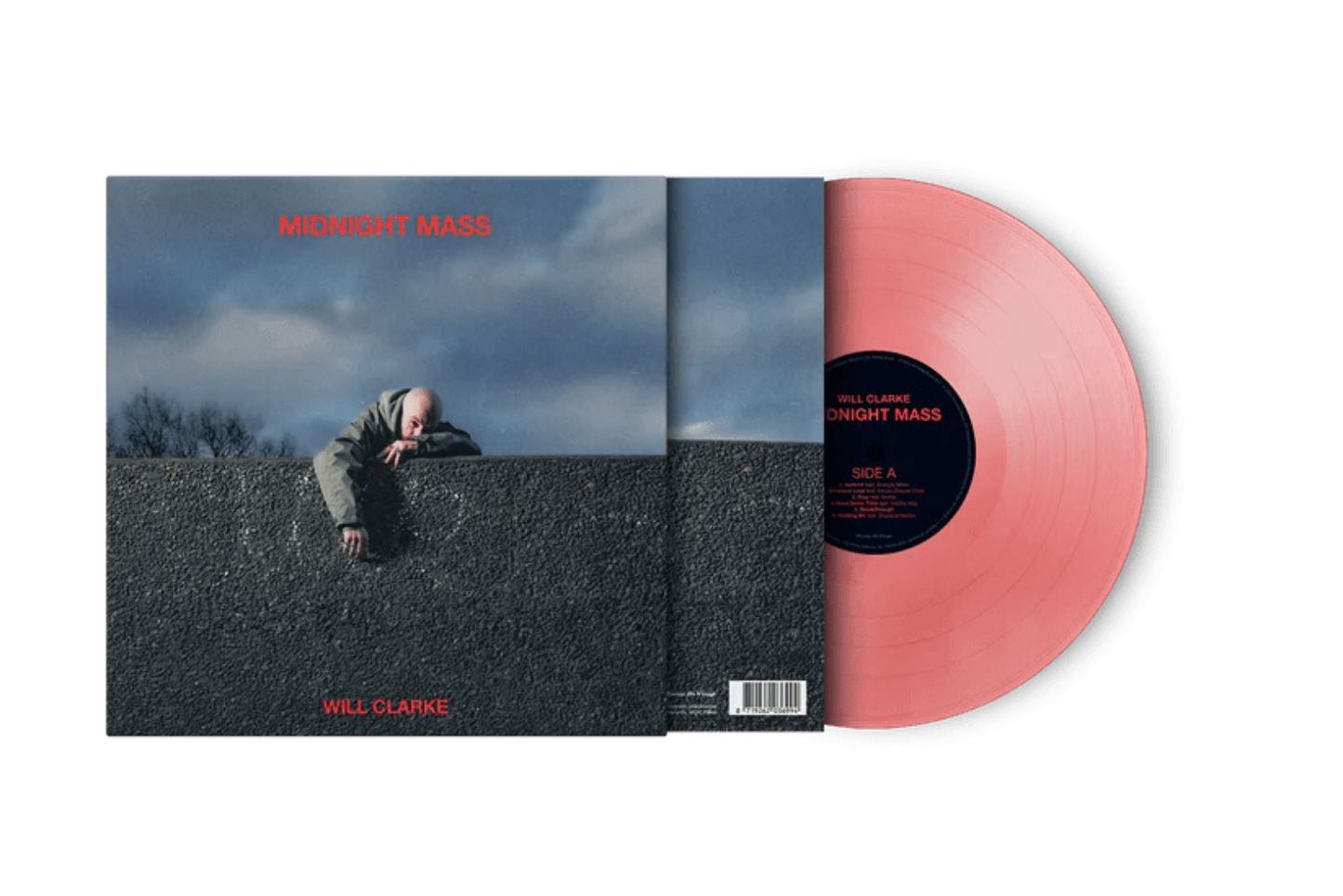 Close-up of Midnight Mass vinyl record showing translucent red pressing.

