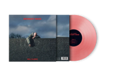 Close-up of Midnight Mass vinyl record showing translucent red pressing.

