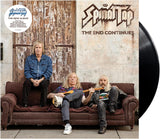 Album cover for 'The End Continues' by Spinal Tap with three people sitting on a couch.