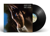 Vinyl record with cover featuring a shirtless man, 'Iggy Pop New Values' text.