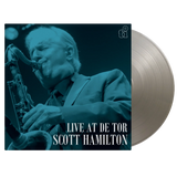 Close-up of Live at De Tor silver vinyl pressing with liner notes