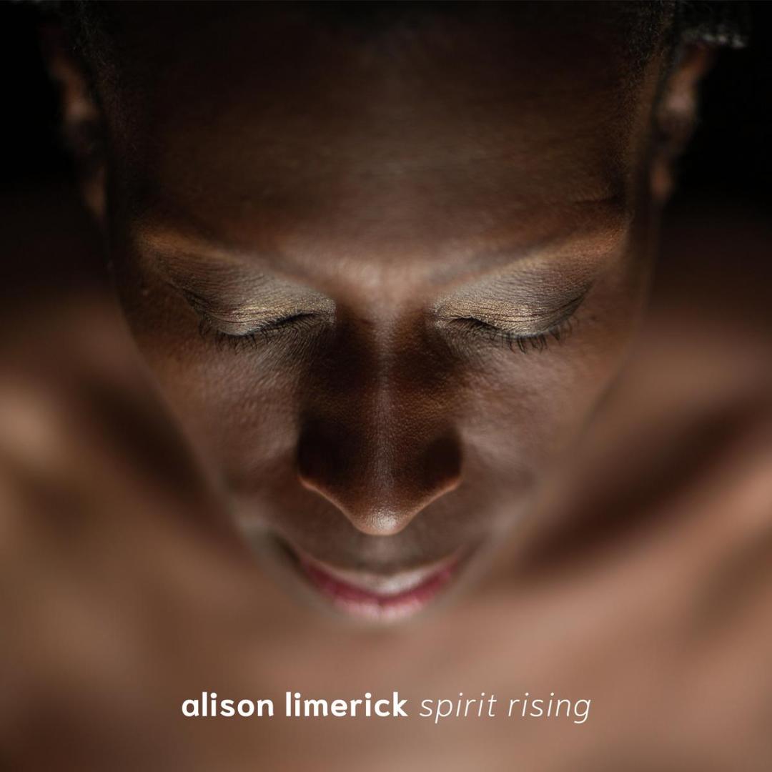 Front cover of Alison Limerick’s Spirit Rising LP alongside bright yellow vinyl