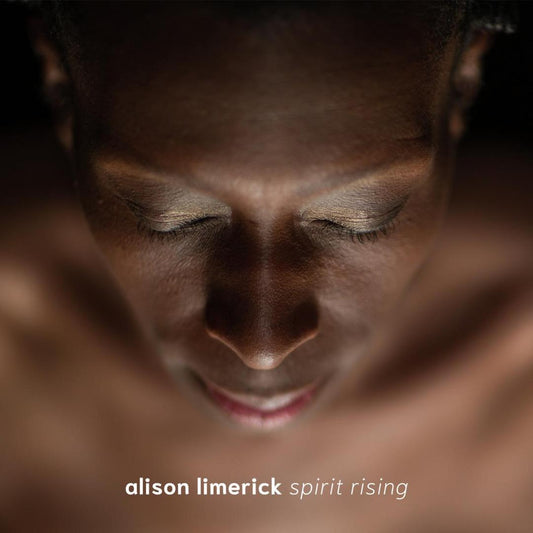 Front cover of Alison Limerick’s Spirit Rising LP alongside bright yellow vinyl