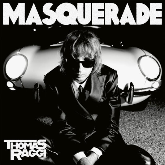 Thomas Raggi Masquerade cover featuring bold colours and striking visual style