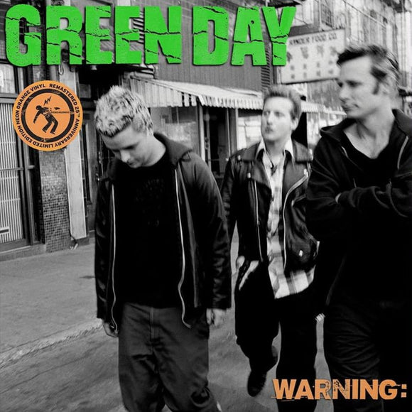 Green Day Warning LP on neon orange vinyl with striking punk-rock artwork