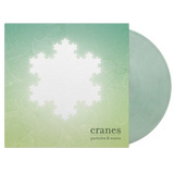 Limited edition Cranes album on striking crystal clear blue & white marbled vinyl.