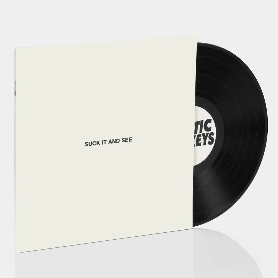 Side view of Suck It and See showing spine and Arctic Monkeys branding.