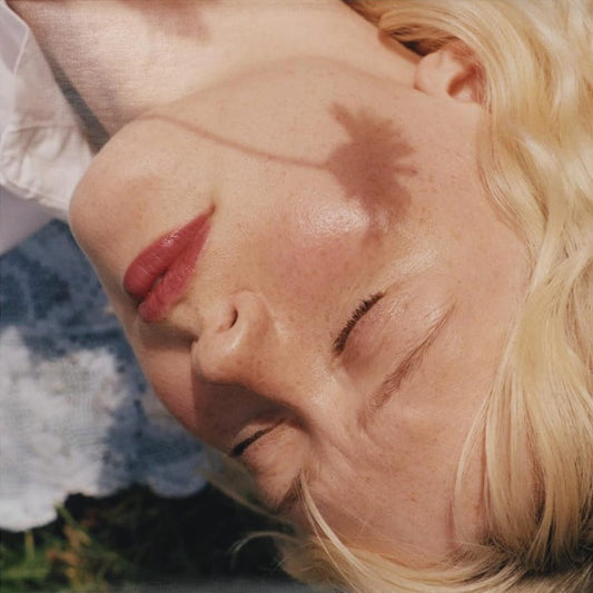 Maisie Peters Florescence album cover featuring soft artwork and title text.