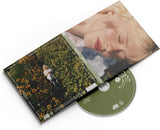 Florescence by Maisie Peters album sleeve with floral-inspired design elements.