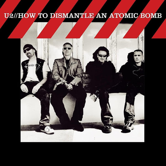 U2 How To Dismantle An Atomic Bomb LP red vinyl front cover with band artwork.