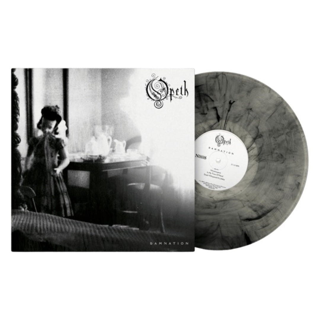 Close-up of smokey vinyl LP showing disc pattern, label, and cover details.