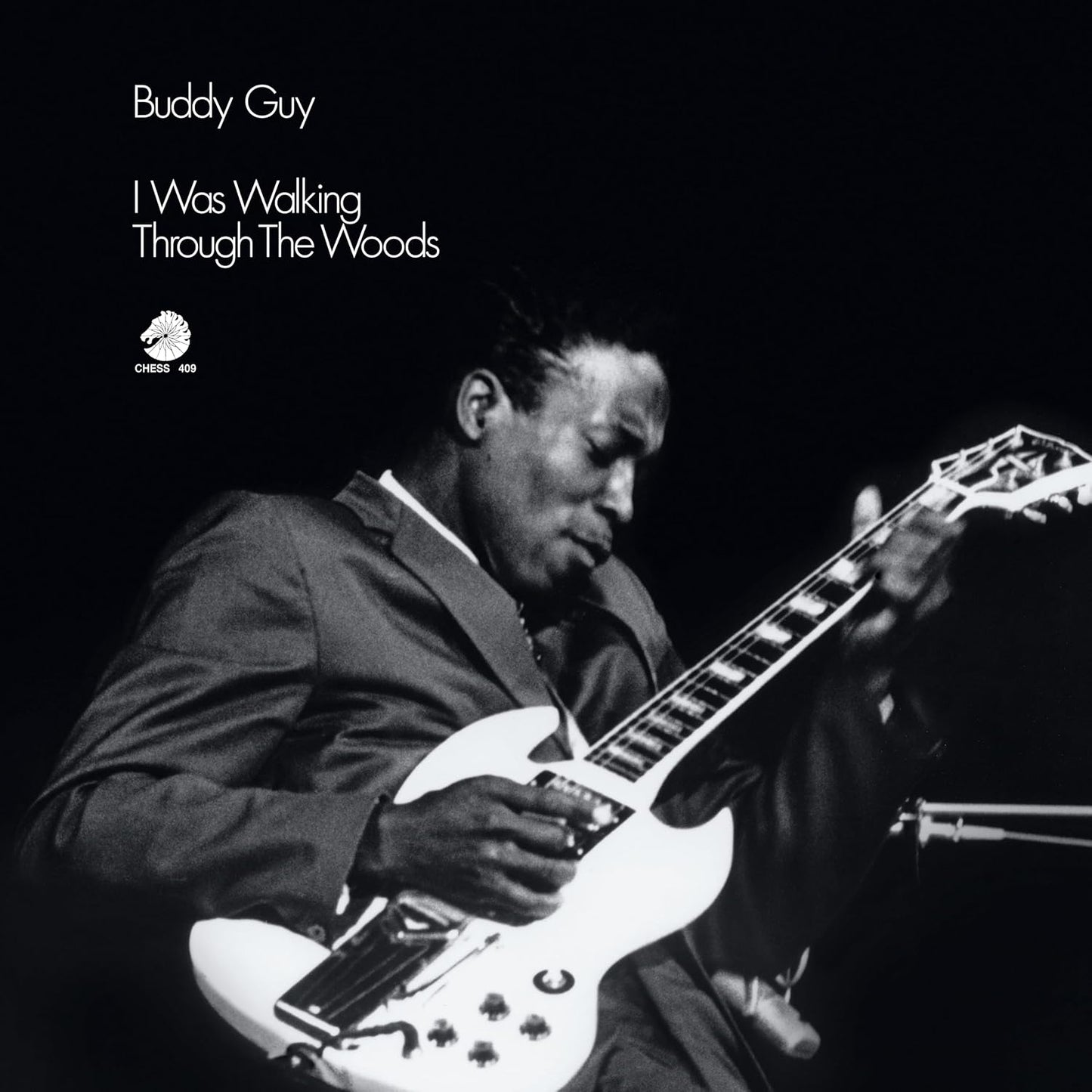 Front cover artwork of Buddy Guy I Was Walking Through The Woods LP featuring the classic Ray Flerlage portrait photograph.