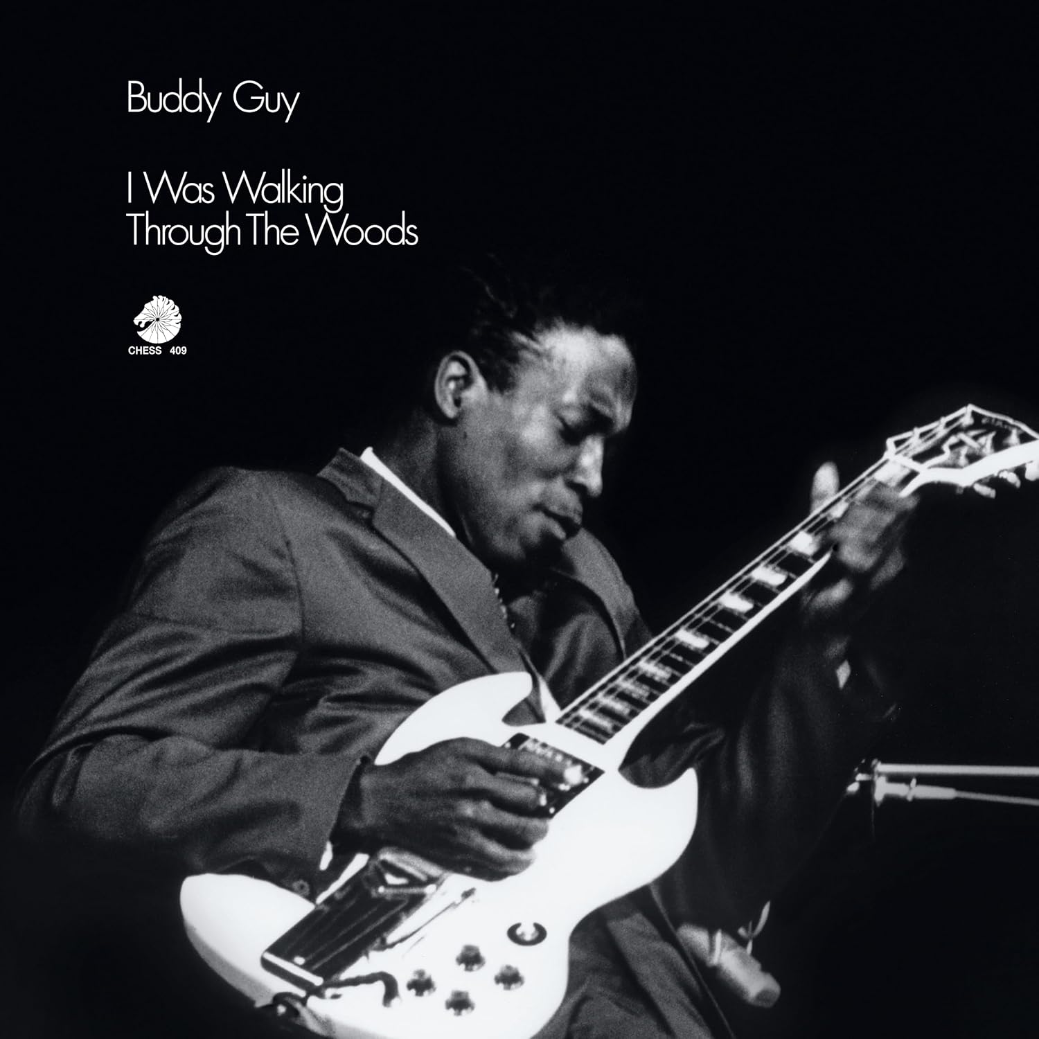 Front cover artwork of Buddy Guy I Was Walking Through The Woods LP featuring the classic Ray Flerlage portrait photograph.