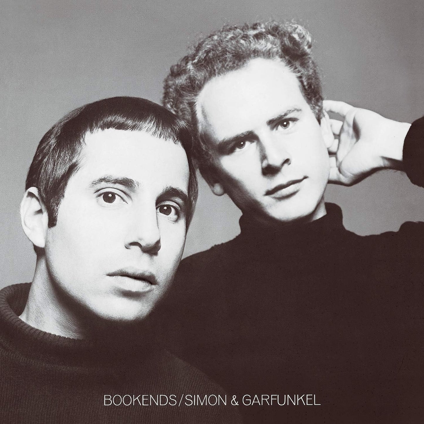 The front cover artwork of the Simon and Garfunkel Bookends album featuring a striking, close-up black and white portrait of the duo.