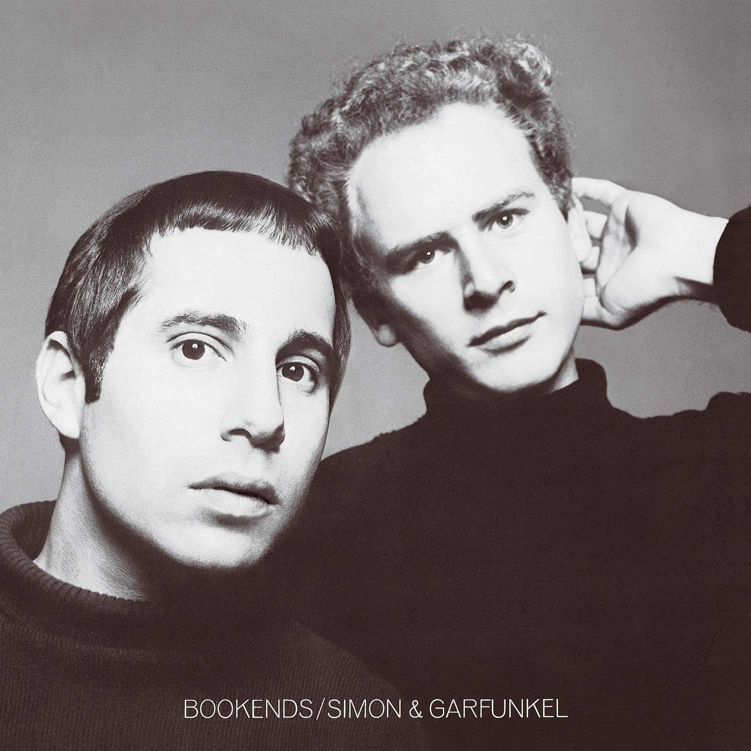 The front cover artwork of the Simon and Garfunkel Bookends album featuring a striking, close-up black and white portrait of the duo.