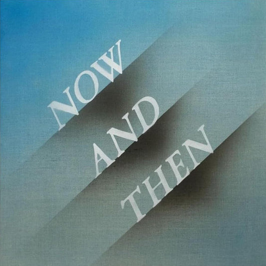 The Beatles Now And Then 12 inch single vinyl featuring final studio recording artwork.