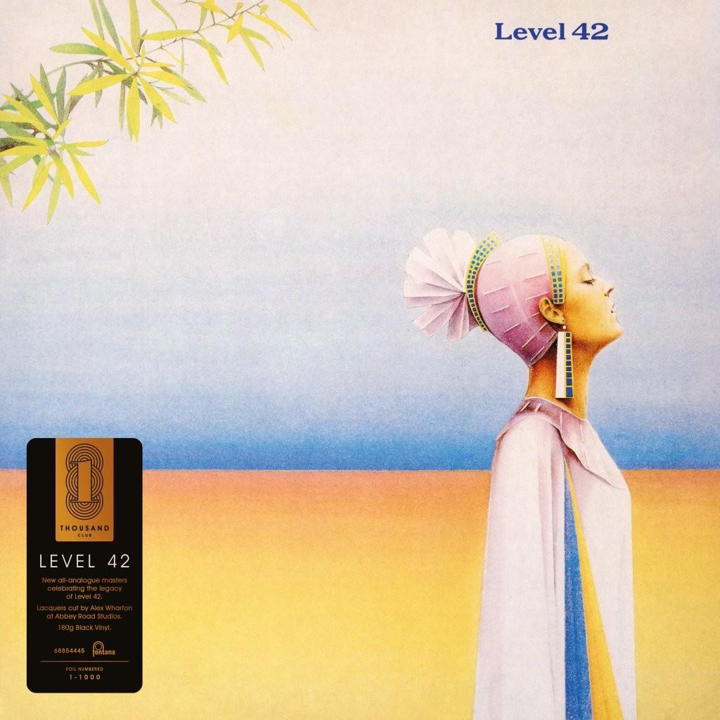 Level 42 Level 42 vinyl due signed by Mark King featuring British pop and jazz-funk sound!!