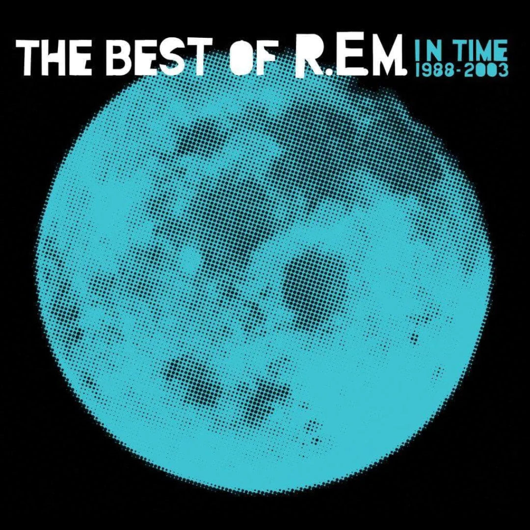 R.E.M. In Time Best Of 1988–2003 cover with blue-toned artwork and bold typography.