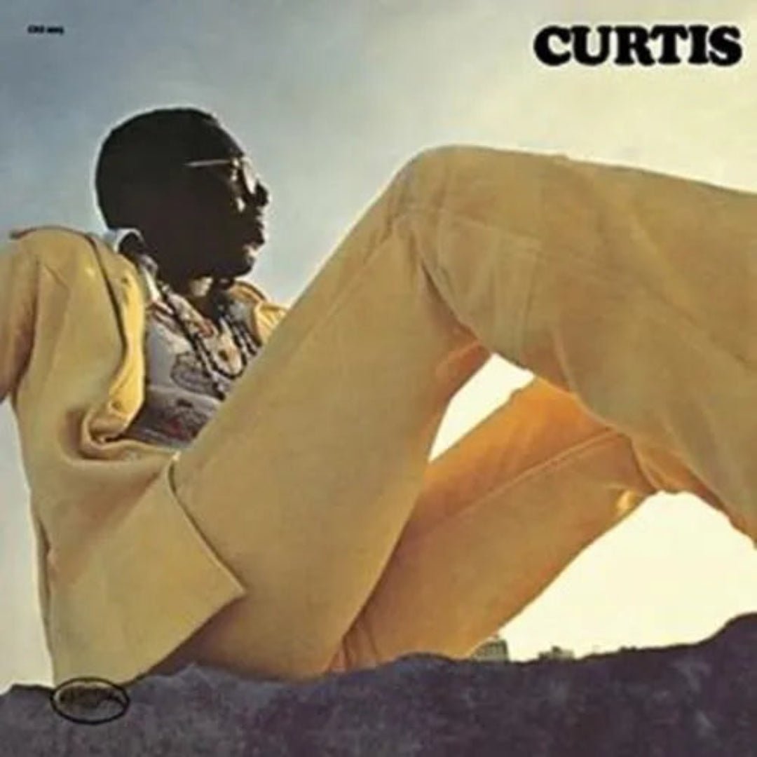 Classic Curtis Mayfield portrait with warm tones and bold psychedelic backdrop