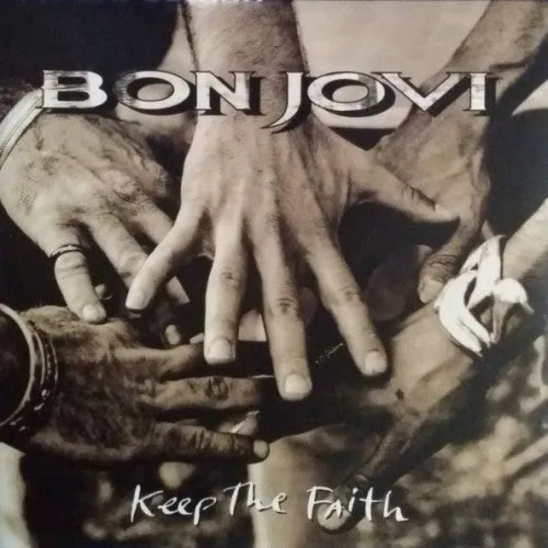 Bon Jovi Keep The Faith album featuring Bed of Roses, In These Arms, and title track