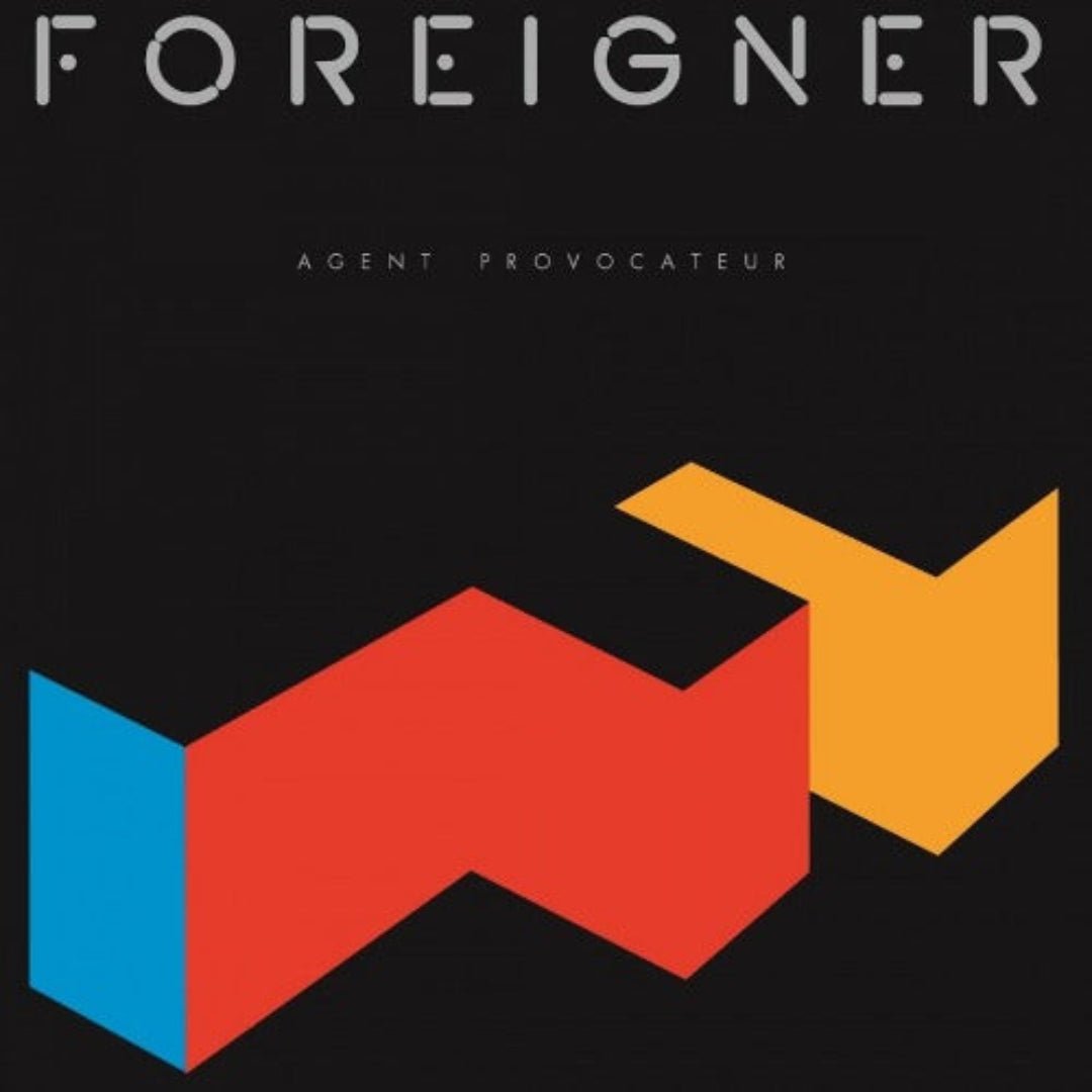 Foreigner’s Agent Provocateur album cover featuring bold geometric red and black artwork.704) LP cover