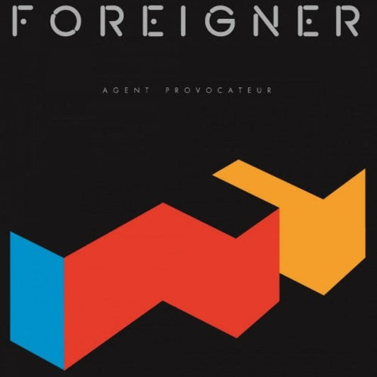 Foreigner’s Agent Provocateur album cover featuring bold geometric red and black artwork.704) LP cover