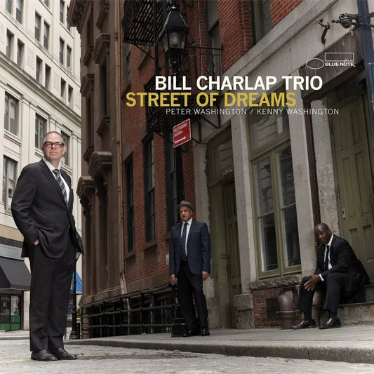 Bill Charlap Trio performing on stage with piano, bass, and drums for Street Of Dreams.
