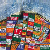 Radiohead Hail to the Thief album cover featuring abstract red and blue design.