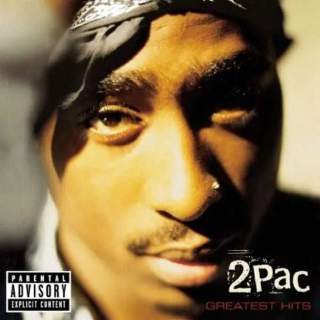 2Pac Greatest Hits album cover featuring Tupac Shakur portrait against a dark backdrop